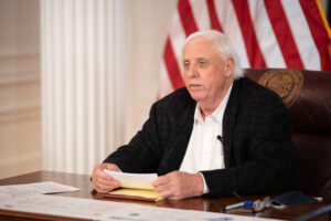 Justice orders relaxing COVID restrictions on business, push for in-class learning